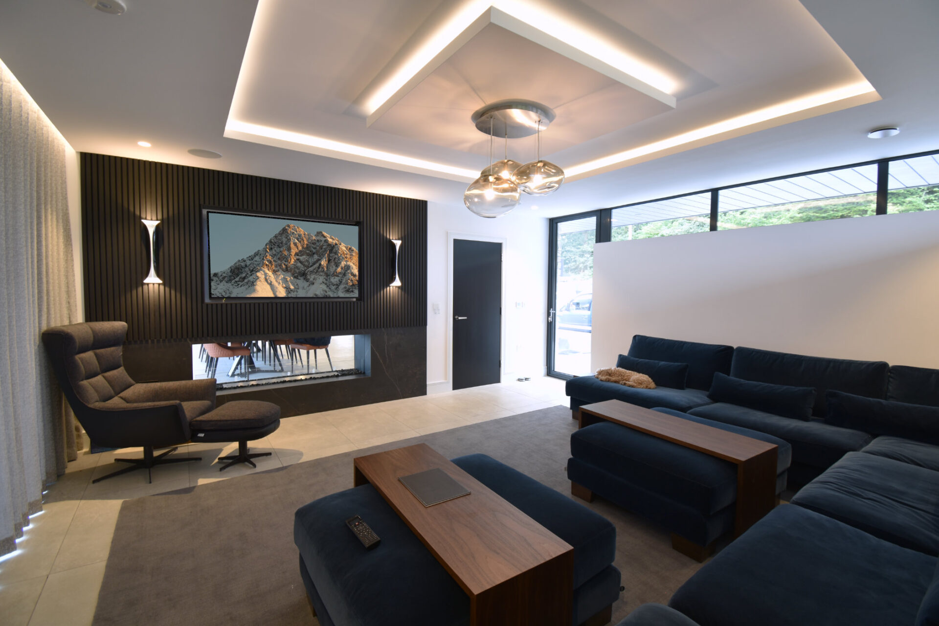 A cinema and games room designed by Creative Home Cinema